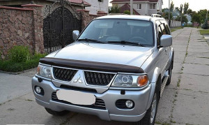 Mitsubishi Pajero Sport 2000-2007 - Дефлектор капота (мухобойка), темный. (SIM) фото, цена