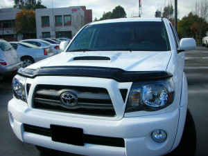 Toyota Tacoma 2005-2011 - Дефлектор капота (мухобойка) (LUND) фото, цена
