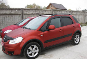 Suzuki SX4 2006-2012 - Дефлекторы окон (ветровики), к-т 4 шт, темные (Htb). SIM фото, цена