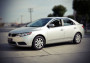 Kia Cerato 2010-2013 - Дефлектори вікон з метал чорним молдингом, к-т 4 шт (Wellvisors) фото, цена