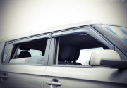 Kia Soul 2010-2013 - Дефлектори вікон з метал чорним молдингом, к-т 4 шт (Wellvisors) фото, цена