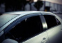 Toyota Yaris 2007-2012 - Дефлектори вікон з метал чорним молдингом, к-т 4 шт (Wellvisors) фото, цена