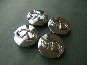 Infiniti M 2006-2010 - Хромированные значки на колесные диски  к-т 4 шт. фото, цена